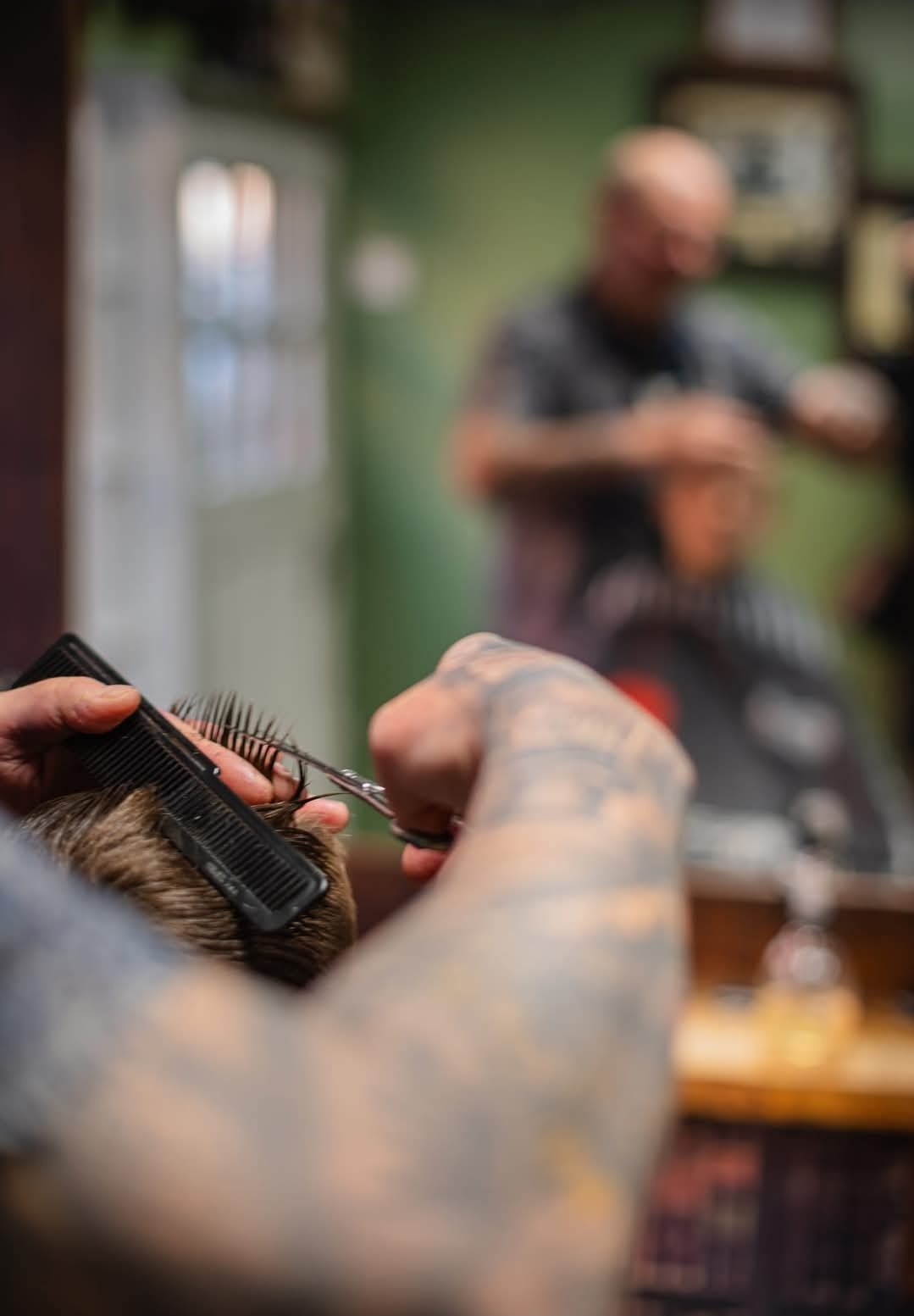 A cut in progress at Swan Street Barber Shop, Bawtry